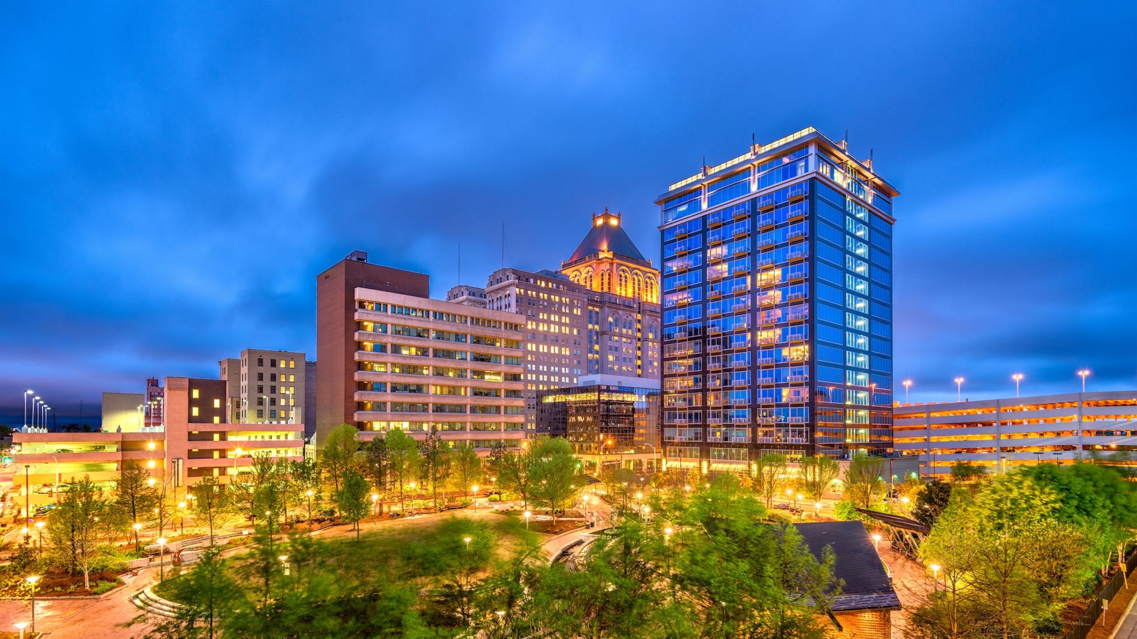 Hawthorne at Green Valley palm leaves blowing in the wind against a blue sky